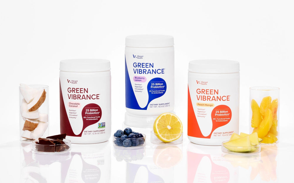 Three different flavors of Green Vibrance: Blueberry Lemon, Peach Mango, and Chocolate Coconut